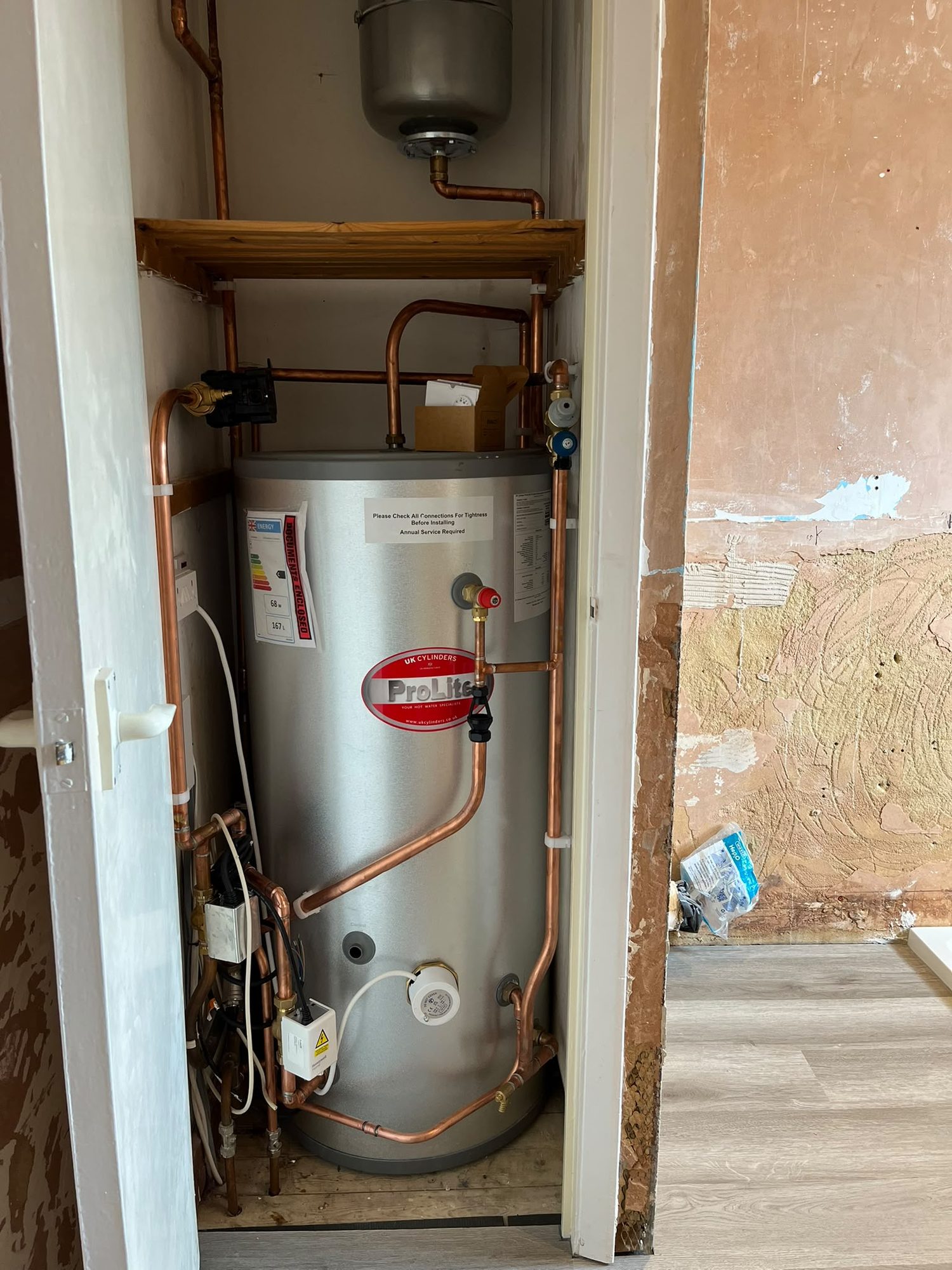 Unvented hot water cylinder installation with G3 safety valves and copper pipework